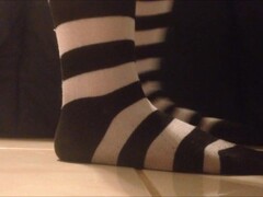 Black and White Striped Sock Presenting Thumb