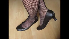 black leather pumps and fishnets, shoeplay and dangling by Isabelle-Sandrine Thumb